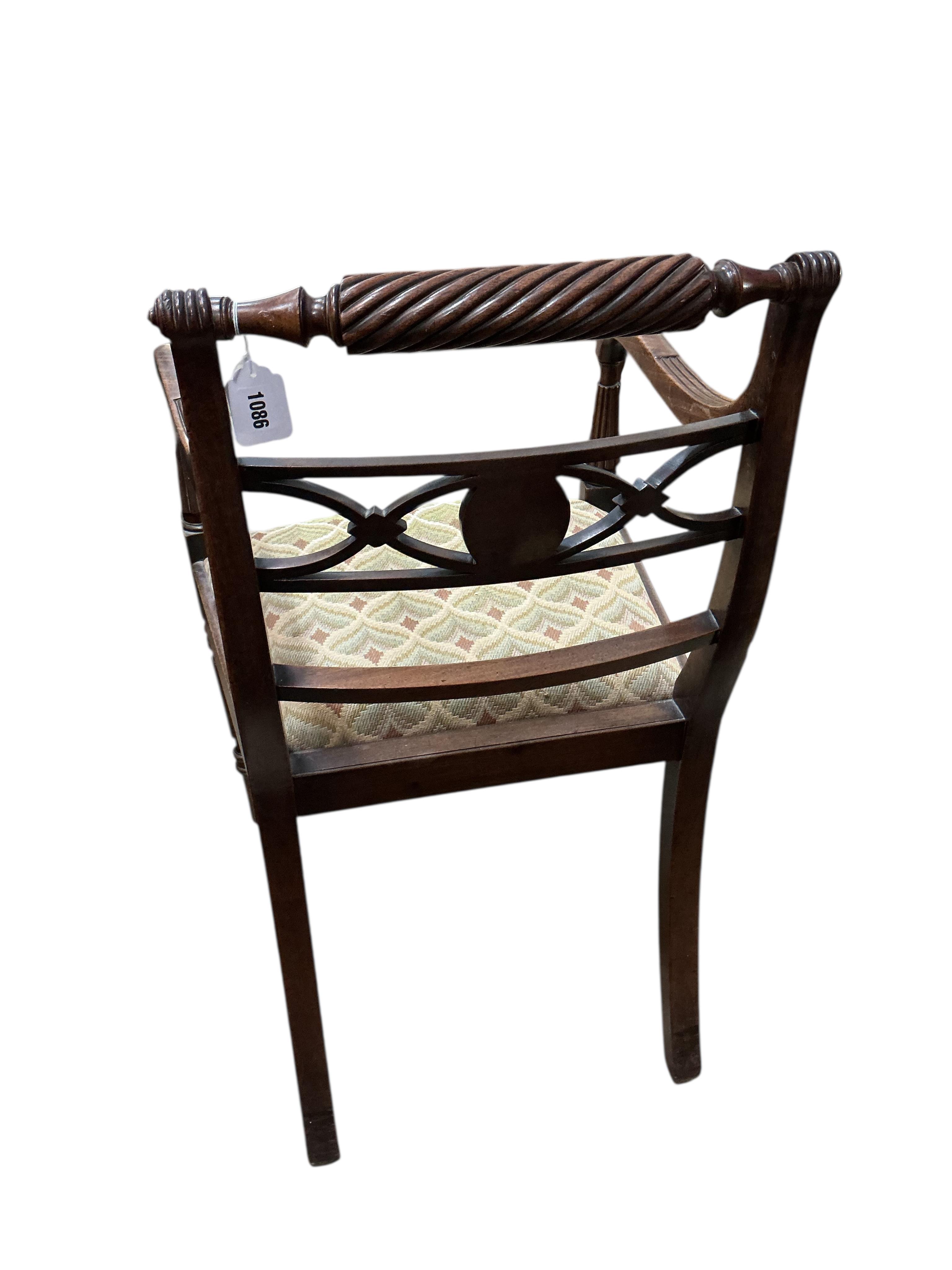 A Regency mahogany elbow chair, width 51cm, depth 46cm, height 87cm